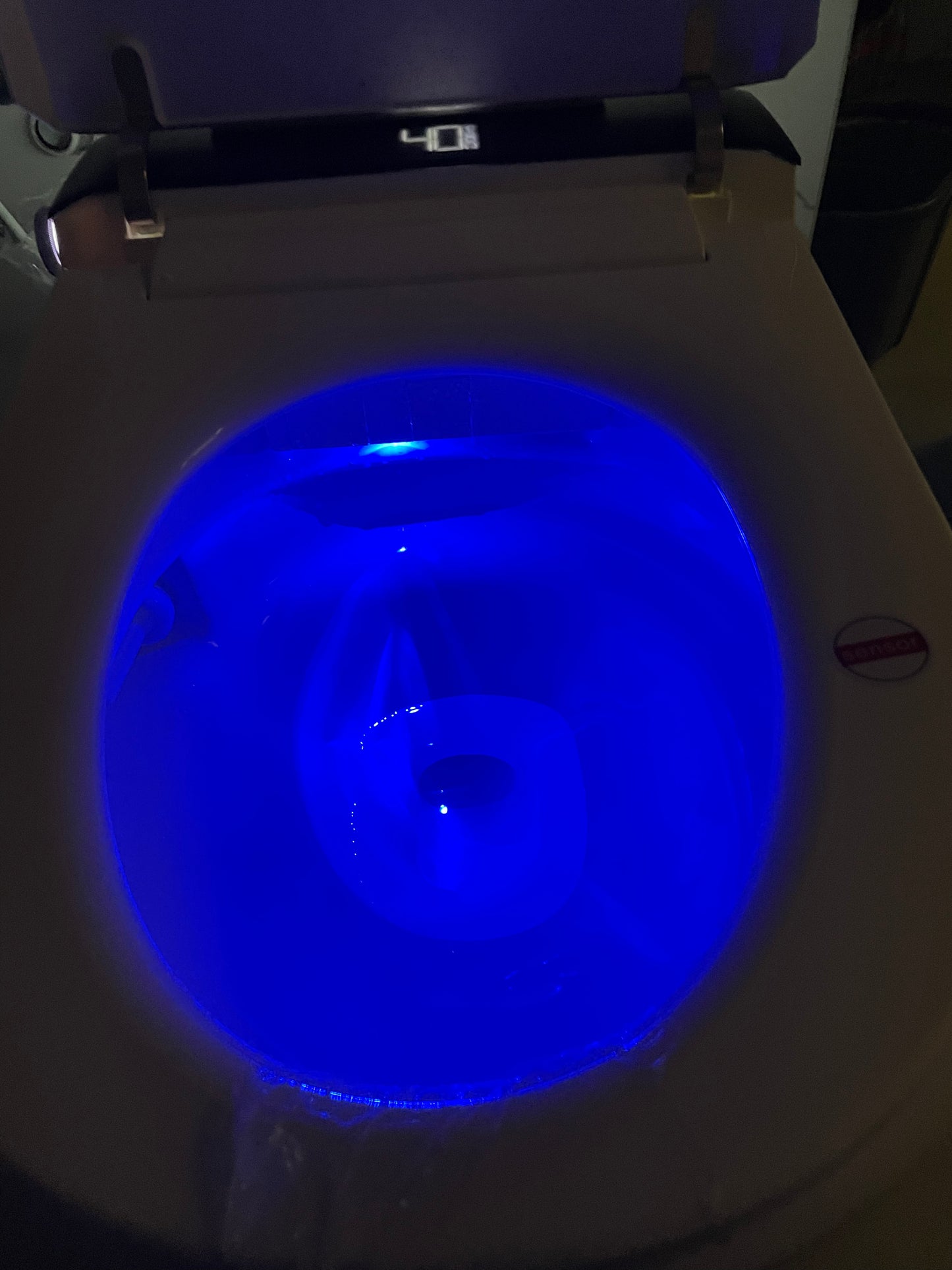 Smart Toilet  Hola with buil-in tank, Geberit type frame, bowl illuminated with blue light in a dark setting www.hola.shop.pl